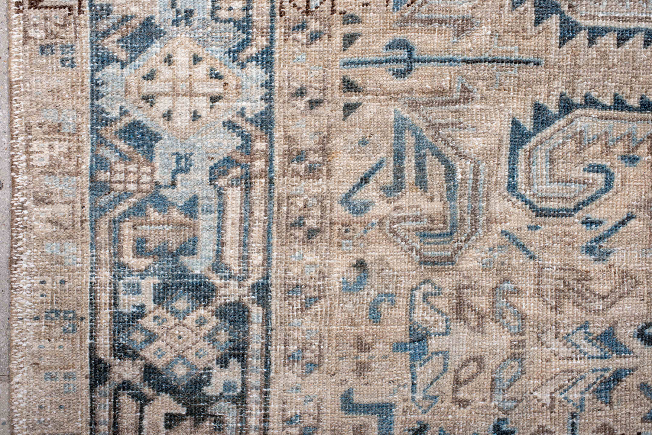 7' x 7' one-of-a-kind handmade antique Heriz rug. Color palette: ivory, beige, slate, taupe, sky blue, charcoal, gray