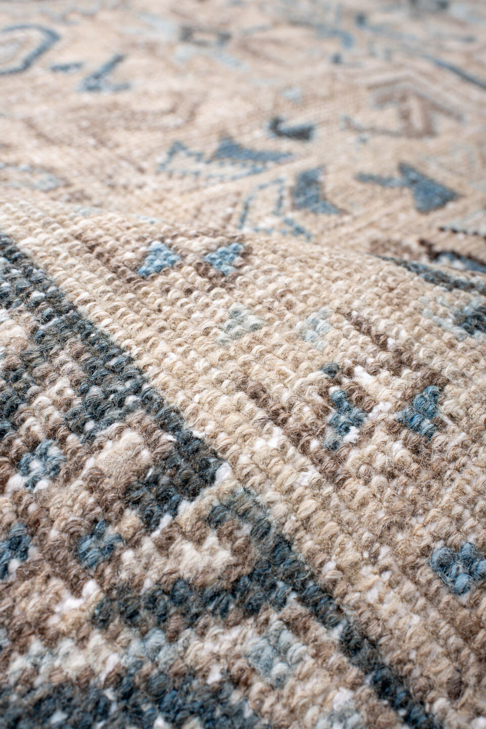 7' x 7' one-of-a-kind handmade antique Heriz rug. Color palette: ivory, beige, slate, taupe, sky blue, charcoal, gray
