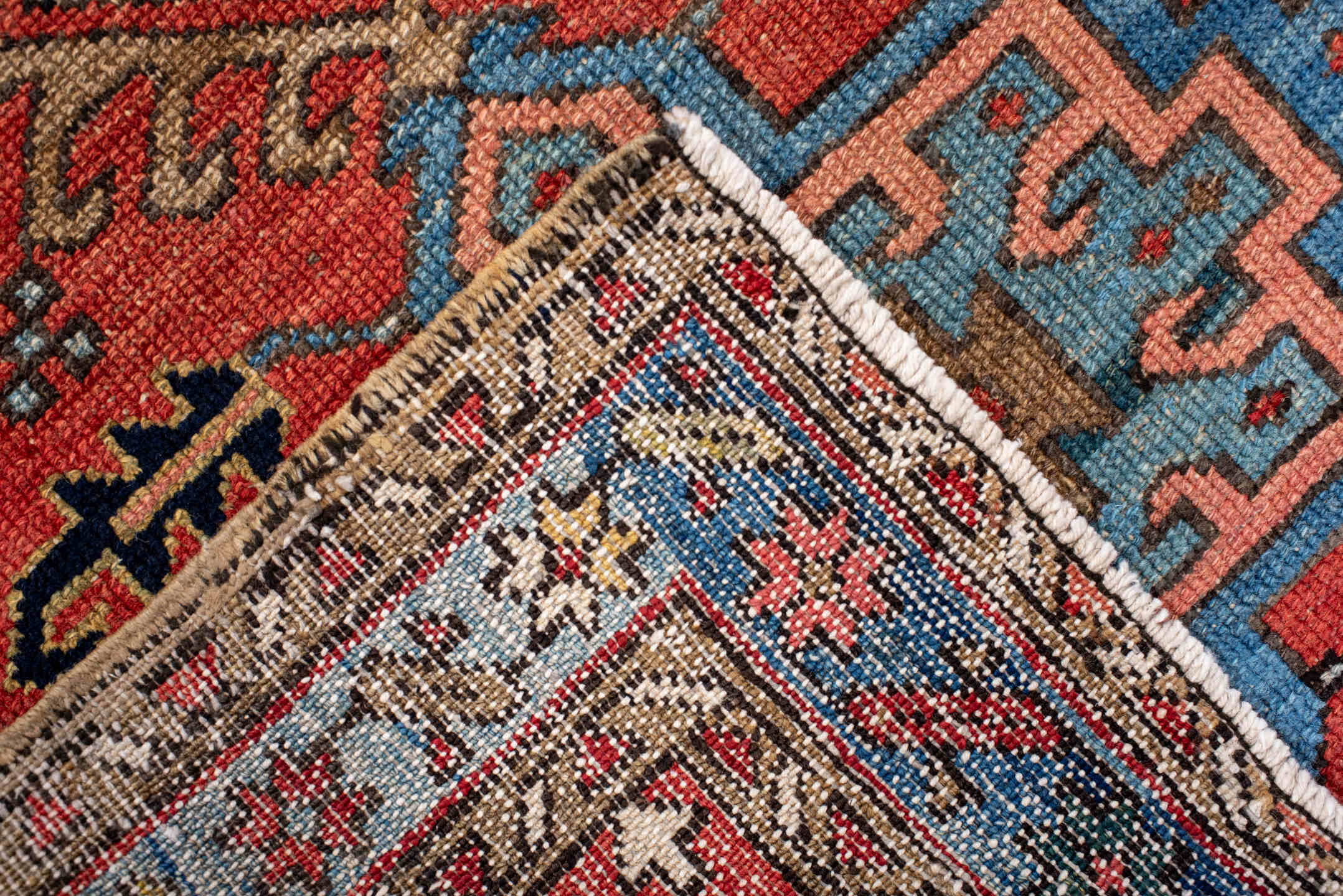 3' x 4' one-of-a-kind handmade antique Karaje small size rug. Color palette: rust, sky blue, ivory, navy, camel, rose, gold