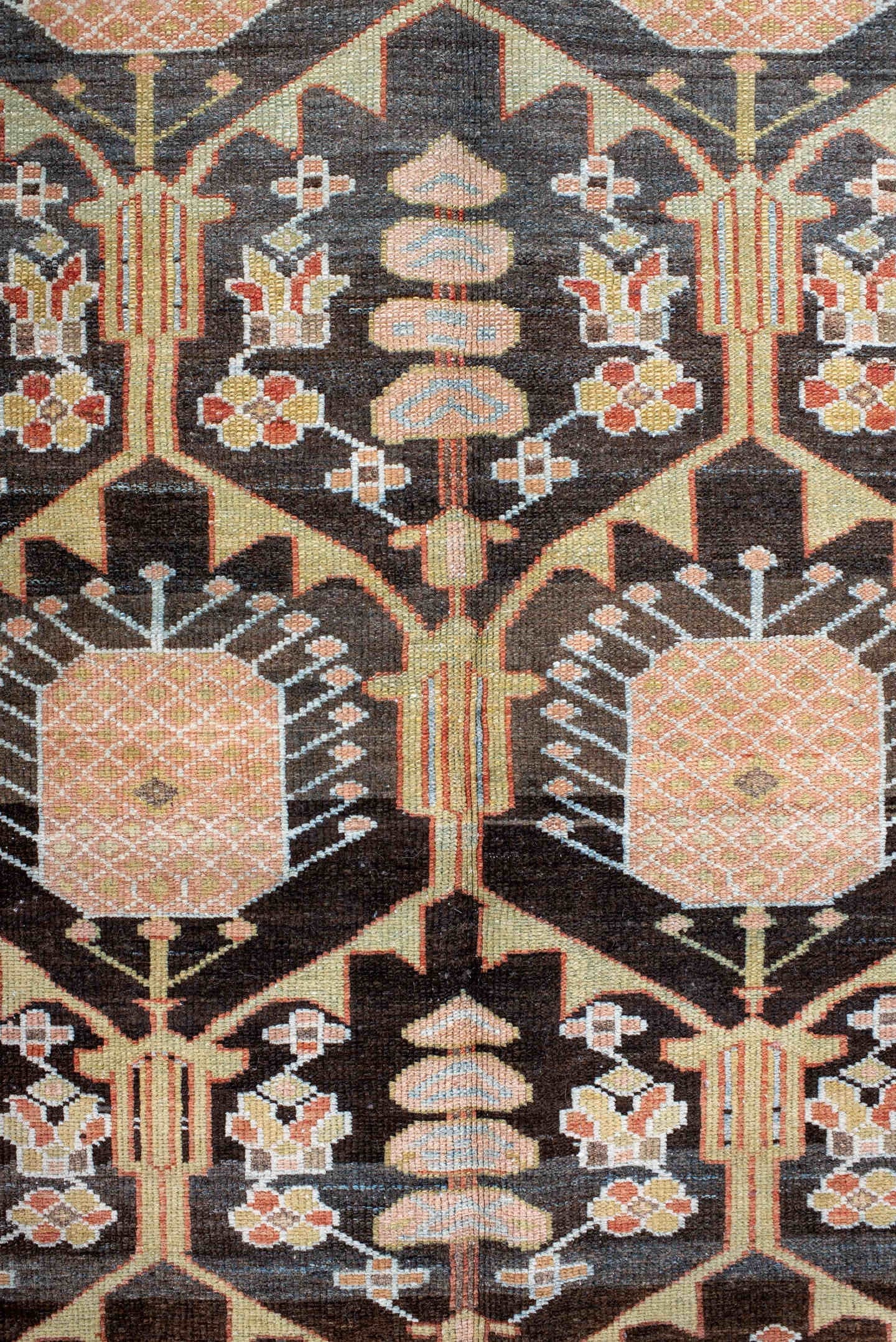 4' x 7' one-of-a-kind handmade antique Baktiary rug. Color palette: rust, charcoal, camel, ivory, soft blue, taupe, gold