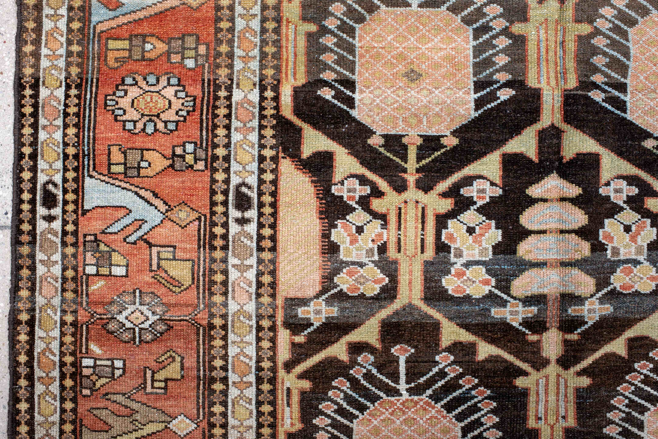 4' x 7' one-of-a-kind handmade antique Baktiary rug. Color palette: rust, charcoal, camel, ivory, soft blue, taupe, gold