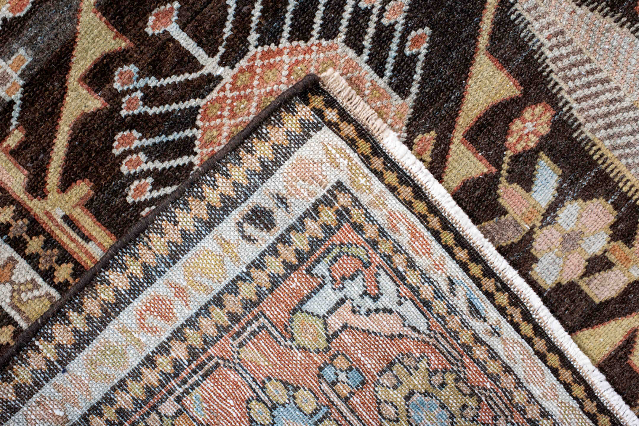 4' x 7' one-of-a-kind handmade antique Baktiary rug. Color palette: rust, charcoal, camel, ivory, soft blue, taupe, gold