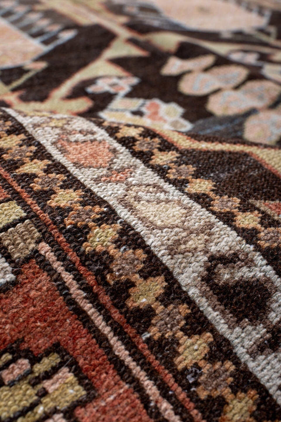 4' x 7' one-of-a-kind handmade antique Baktiary rug. Color palette: rust, charcoal, camel, ivory, soft blue, taupe, gold
