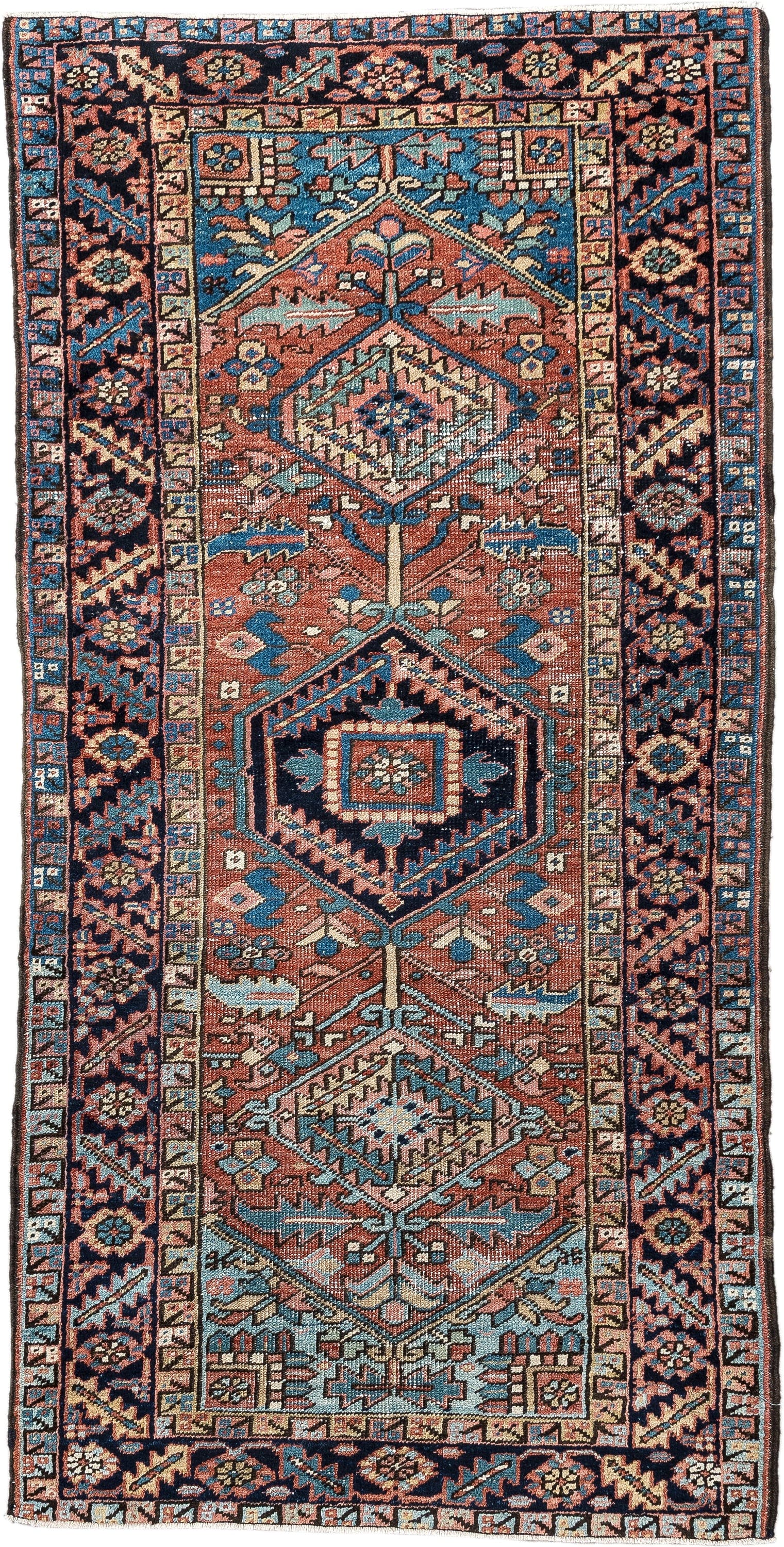 3' x 6' one-of-a-kind handmade antique Heriz small size rug. Color palette: terracotta, navy, sky blue, ivory, camel, rose