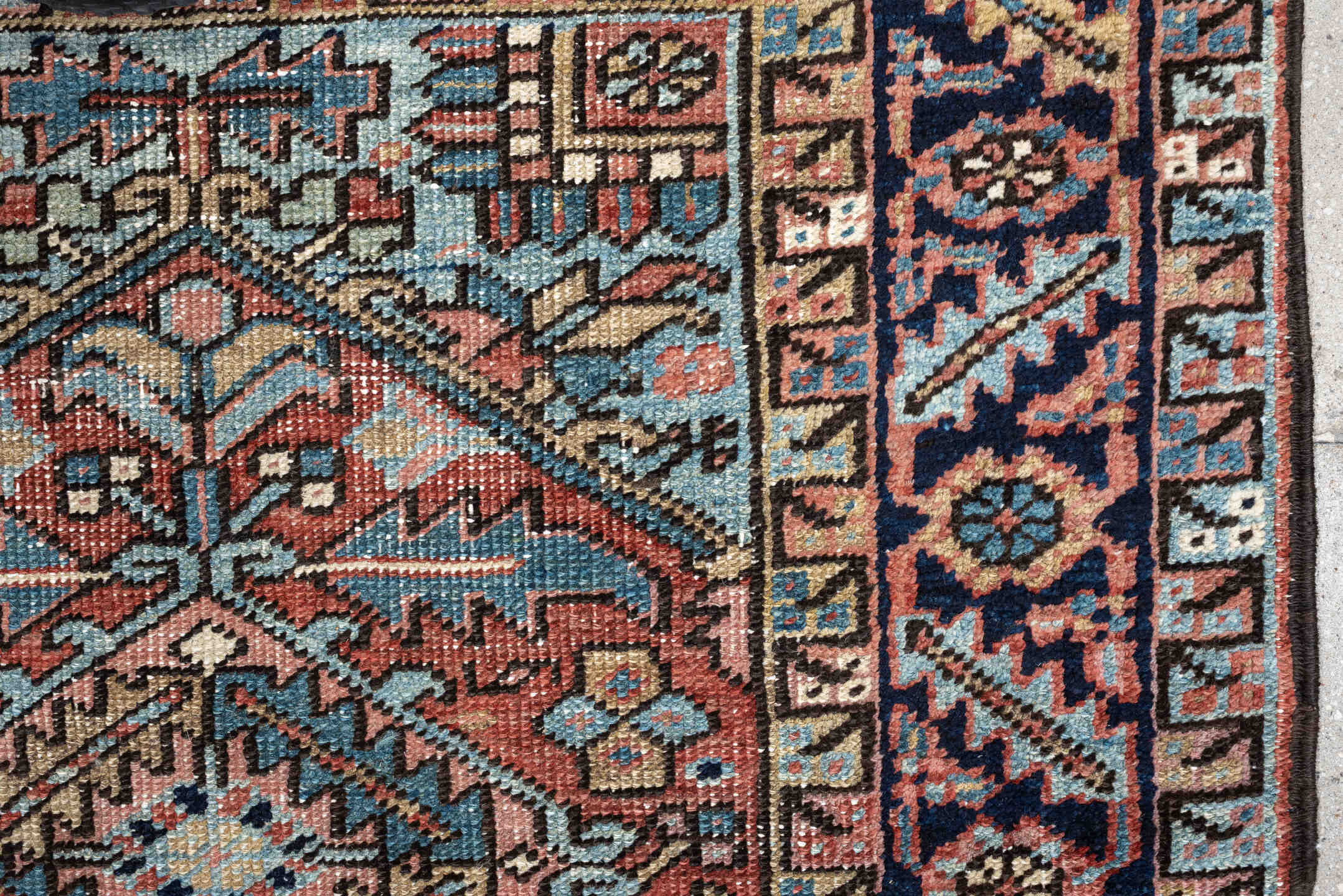 3' x 6' one-of-a-kind handmade antique Heriz small size rug. Color palette: terracotta, navy, sky blue, ivory, camel, rose