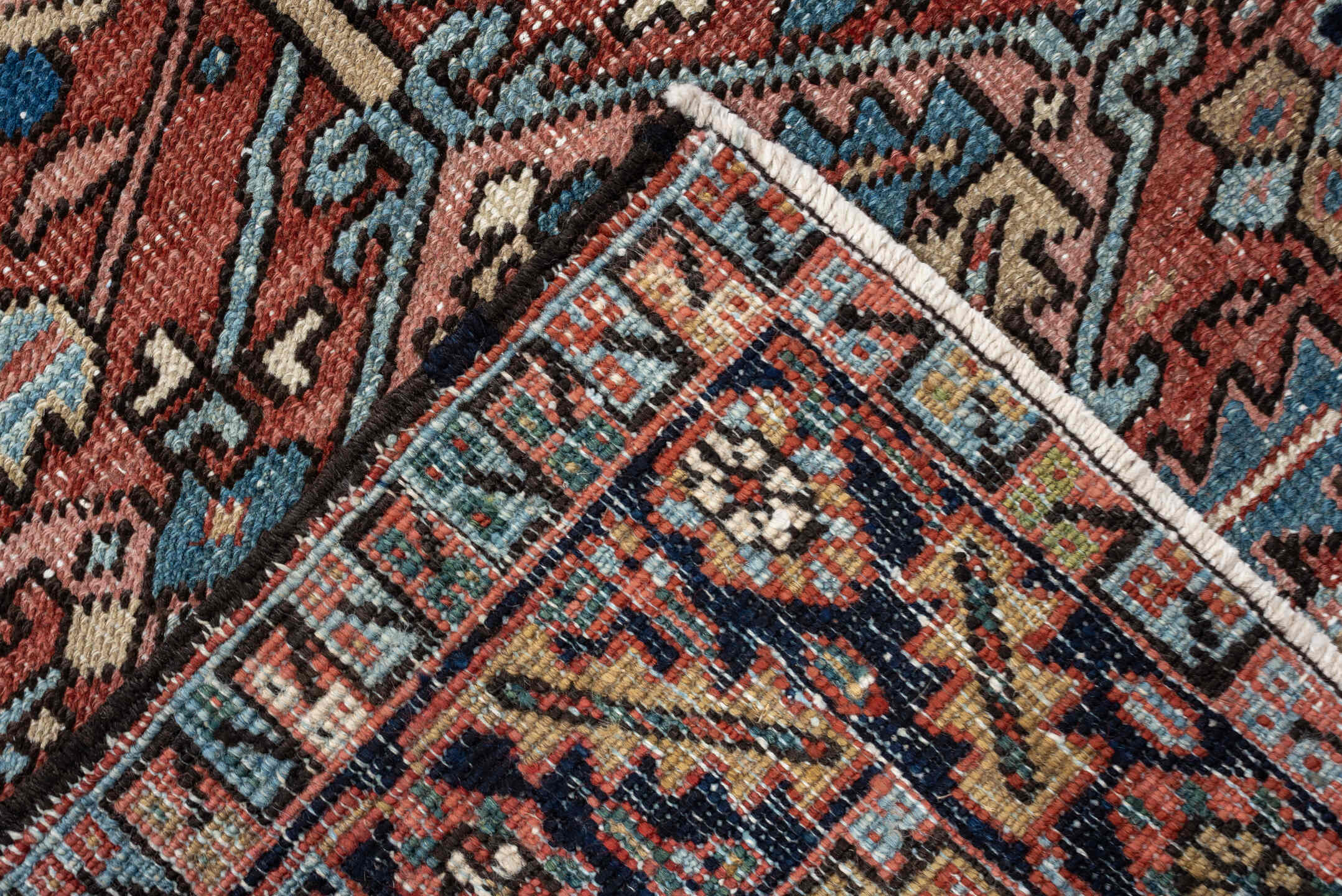 3' x 6' one-of-a-kind handmade antique Heriz small size rug. Color palette: terracotta, navy, sky blue, ivory, camel, rose