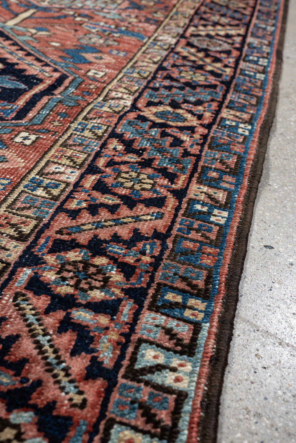 3' x 6' one-of-a-kind handmade antique Heriz small size rug. Color palette: terracotta, navy, sky blue, ivory, camel, rose