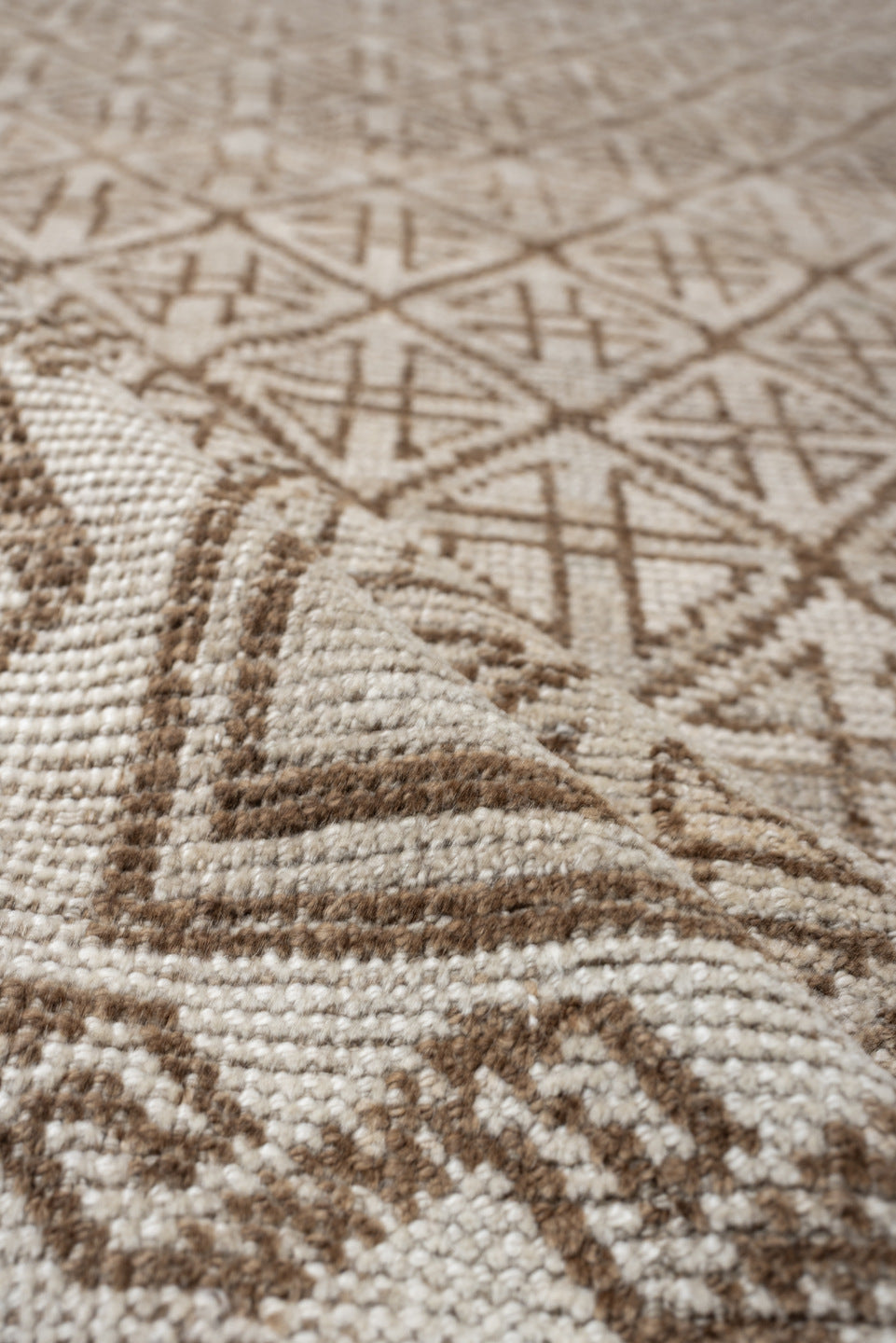 9' x 4' one-of-a-kind handmade antique Belouch rug. Color palette: ivory, camel, taupe, sand, light brown, beige, gray