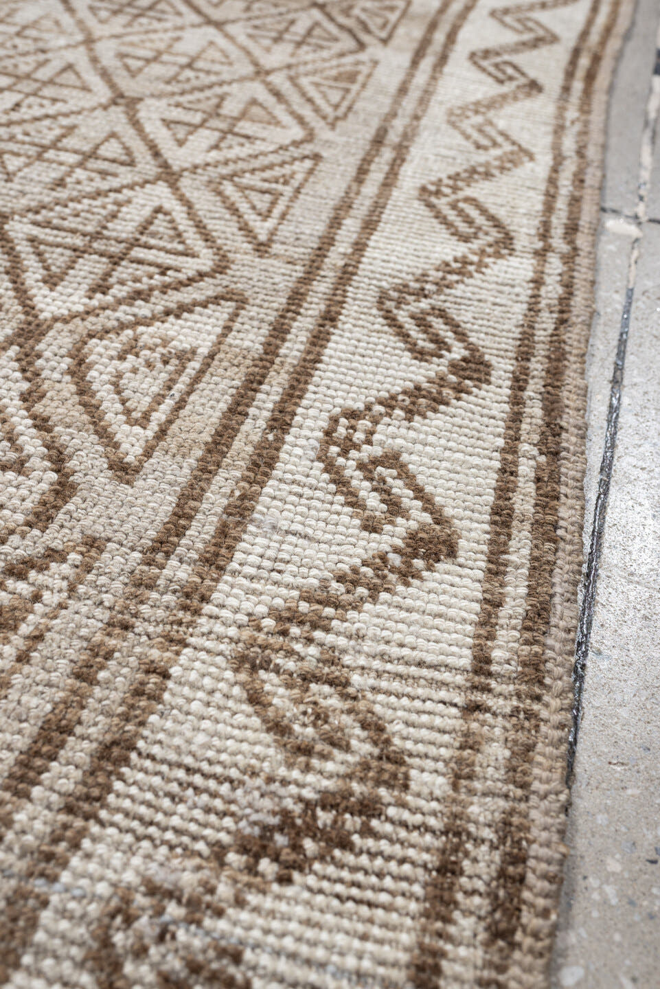 9' x 4' one-of-a-kind handmade antique Belouch rug. Color palette: ivory, camel, taupe, sand, light brown, beige, gray