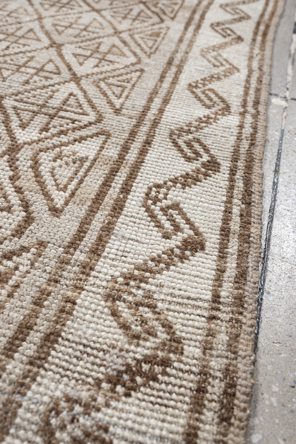 9' x 4' one-of-a-kind handmade antique Belouch rug. Color palette: ivory, camel, taupe, sand, light brown, beige, gray
