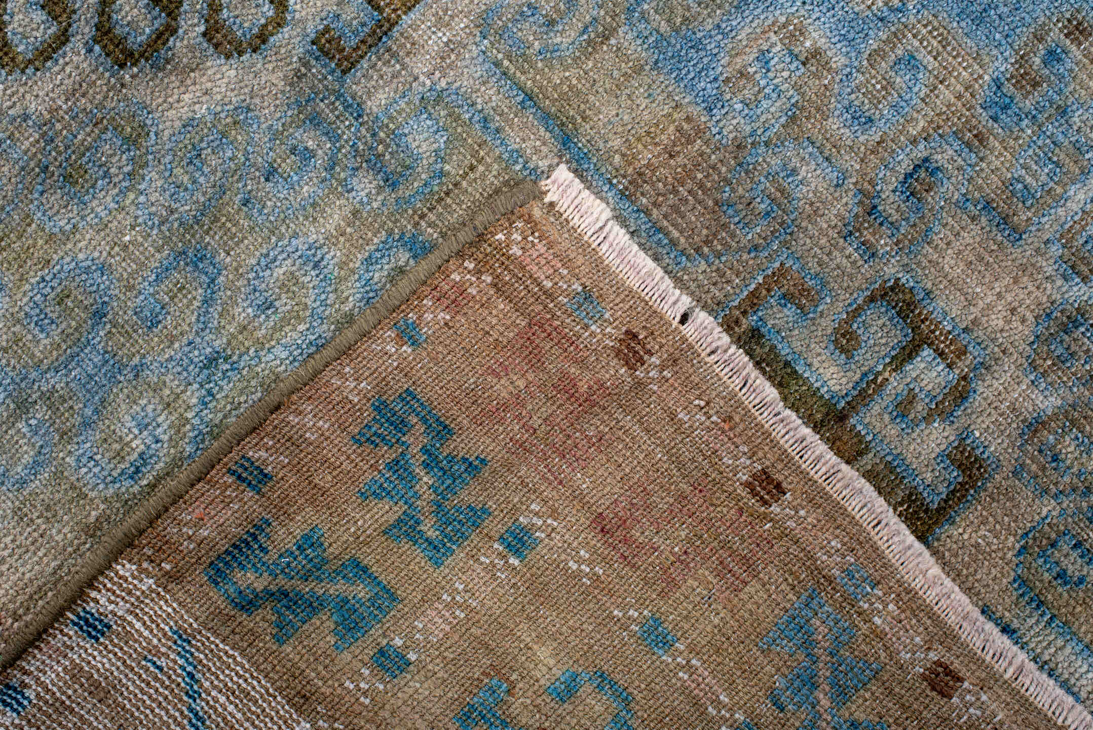 2' x 4' one-of-a-kind handmade antique Belouch small size rug. Color palette: camel, pale blue, taupe, ivory, brown, beige