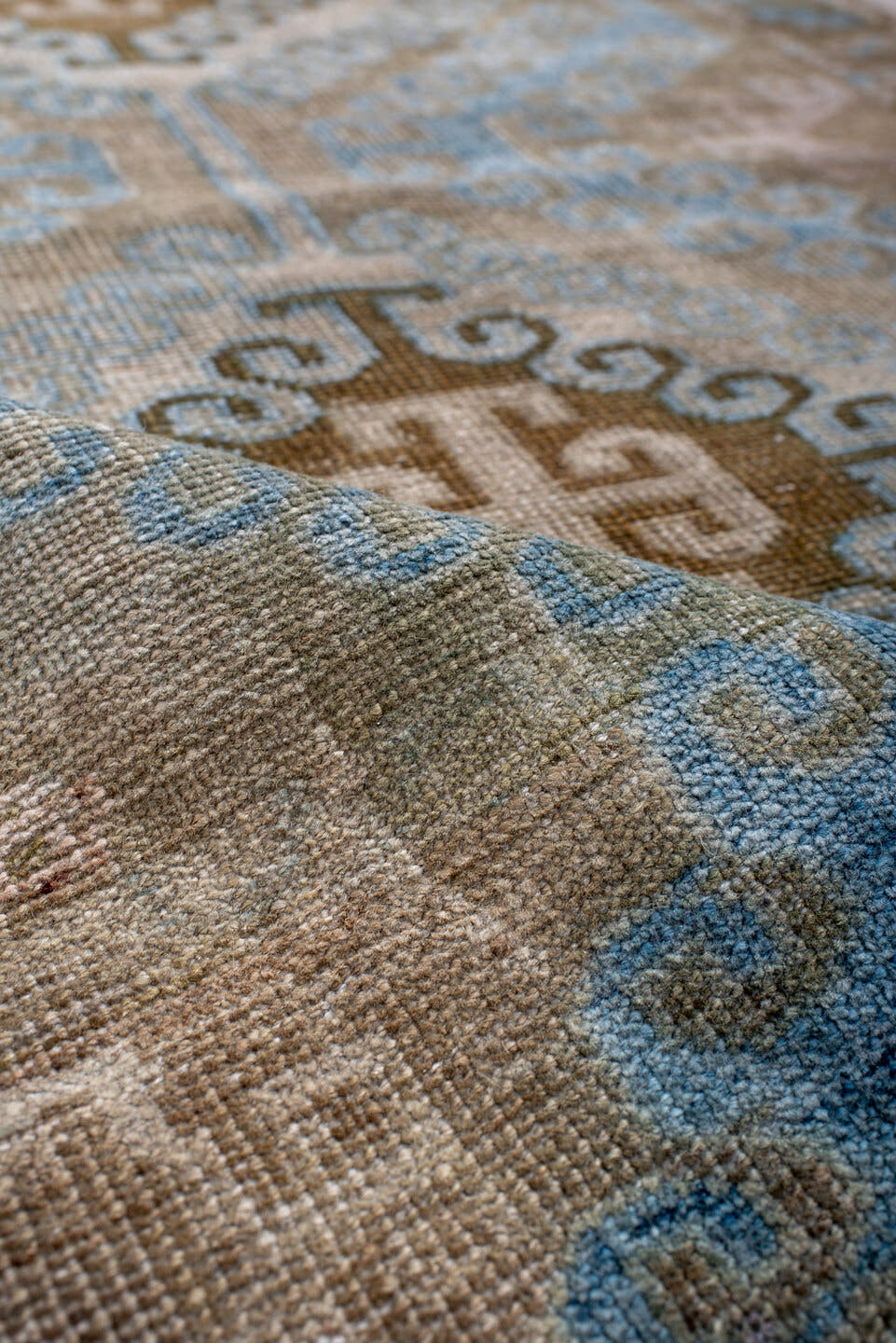 2' x 4' one-of-a-kind handmade antique Belouch small size rug. Color palette: camel, pale blue, taupe, ivory, brown, beige