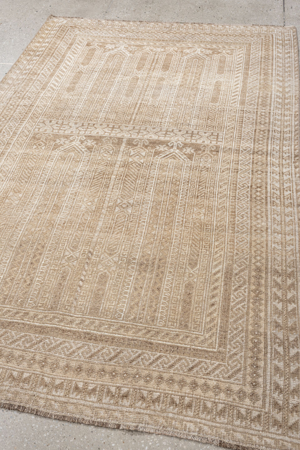 4' x 6' one-of-a-kind handmade antique Belouch small size rug. Color palette: camel, ivory, taupe, sand, beige, gray
