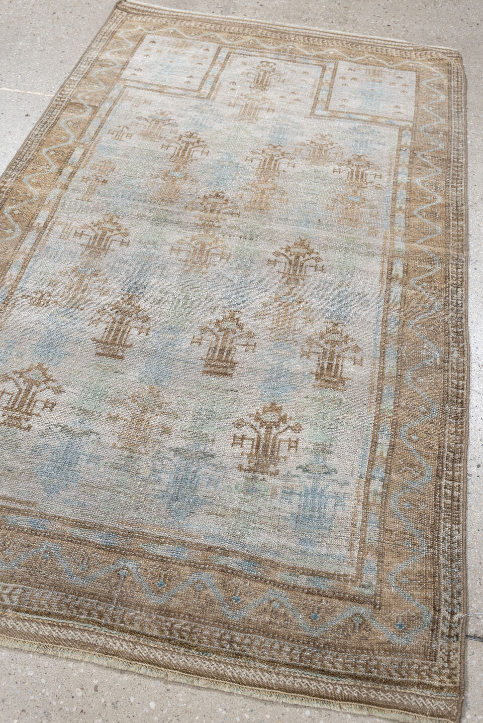 2' x 4' one-of-a-kind handmade antique Belouch small size rug. Color palette: ivory, camel, taupe, sky blue, beige