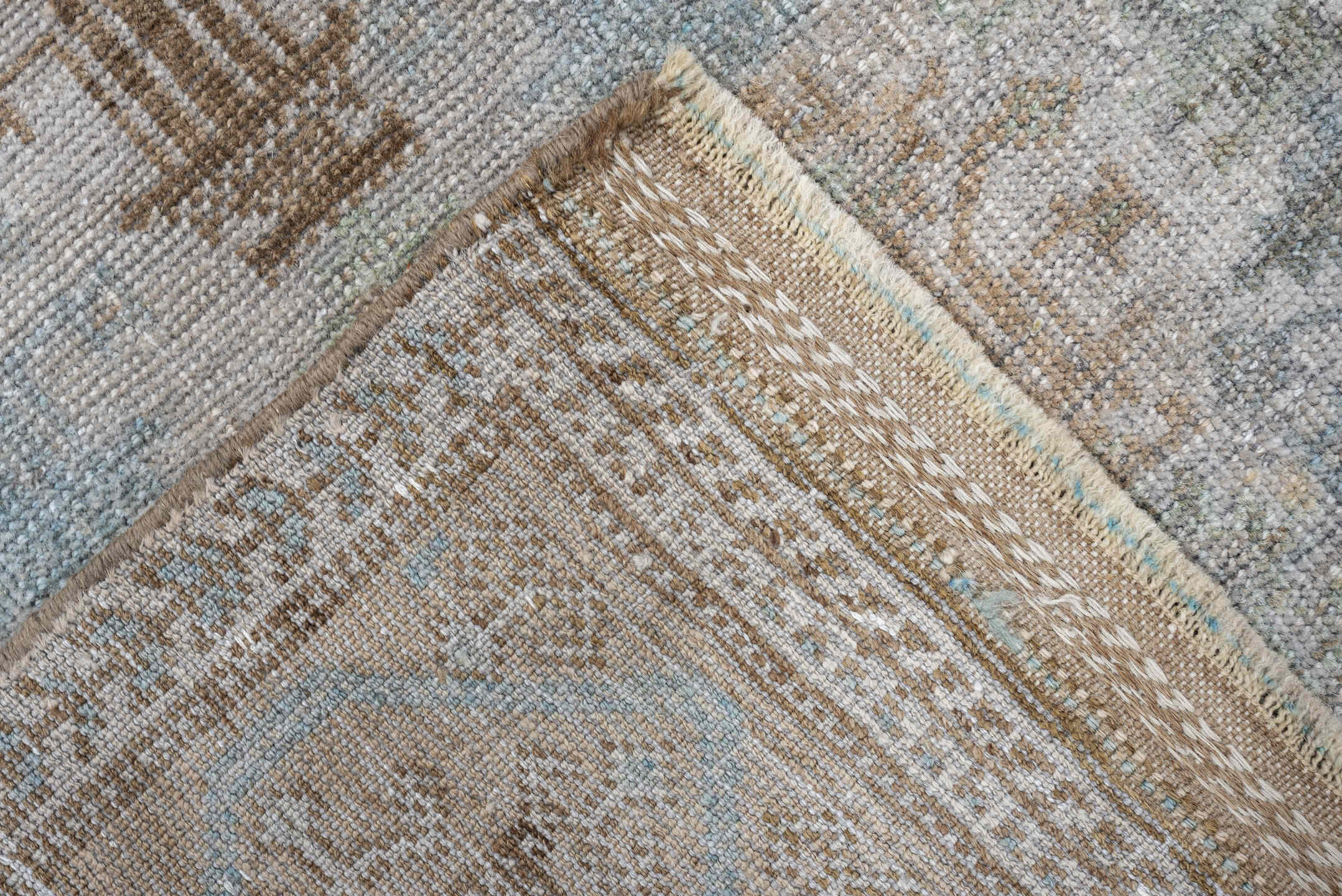 2' x 4' one-of-a-kind handmade antique Belouch small size rug. Color palette: ivory, camel, taupe, sky blue, beige