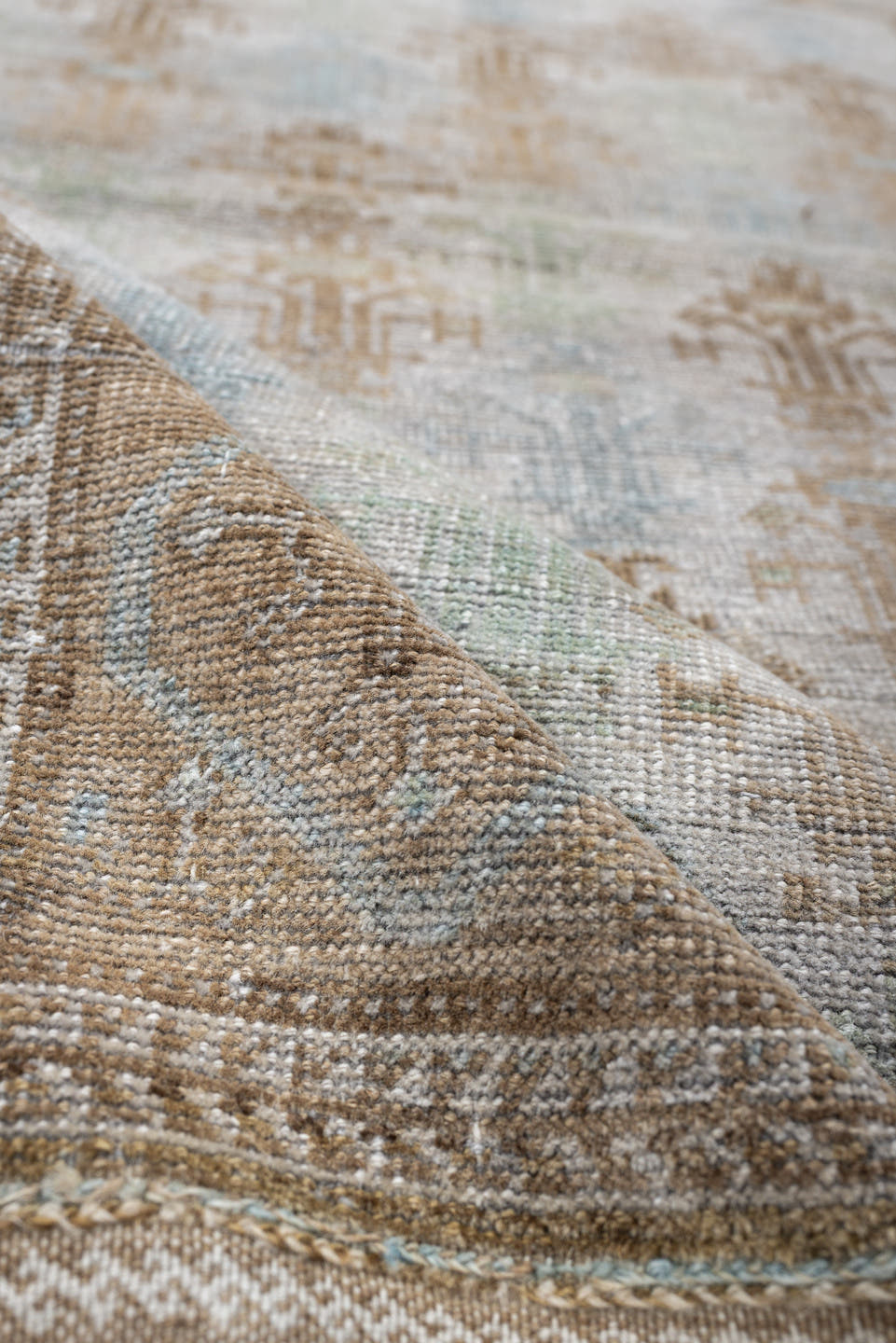 2' x 4' one-of-a-kind handmade antique Belouch small size rug. Color palette: ivory, camel, taupe, sky blue, beige