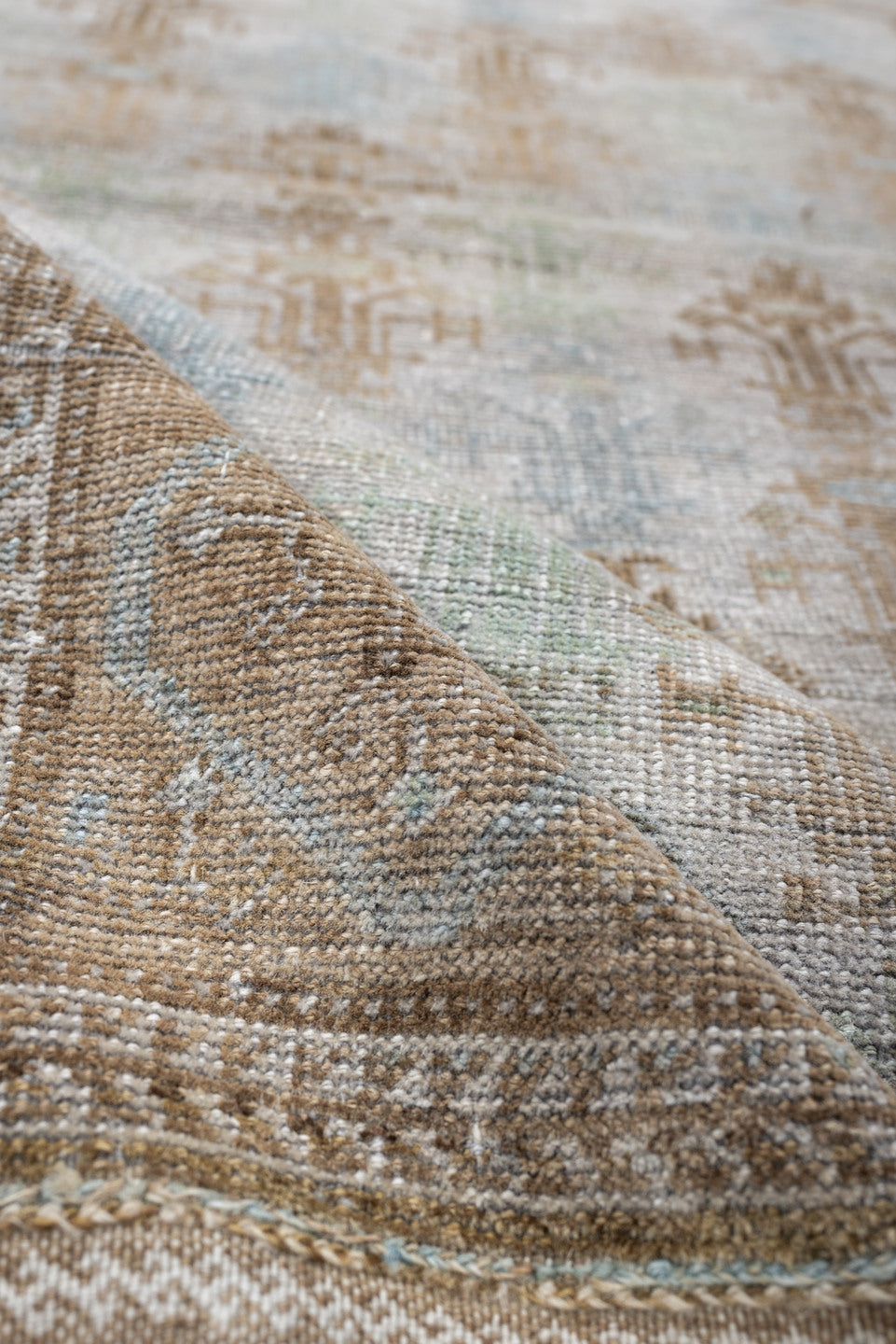 2' x 4' one-of-a-kind handmade antique Belouch small size rug. Color palette: ivory, camel, taupe, sky blue, beige