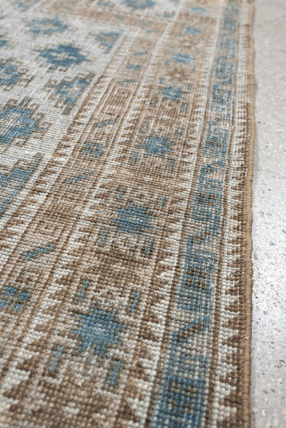 2' x 5' one-of-a-kind handmade antique Belouch small size rug. Color palette: ivory, sky blue, taupe, camel, beige