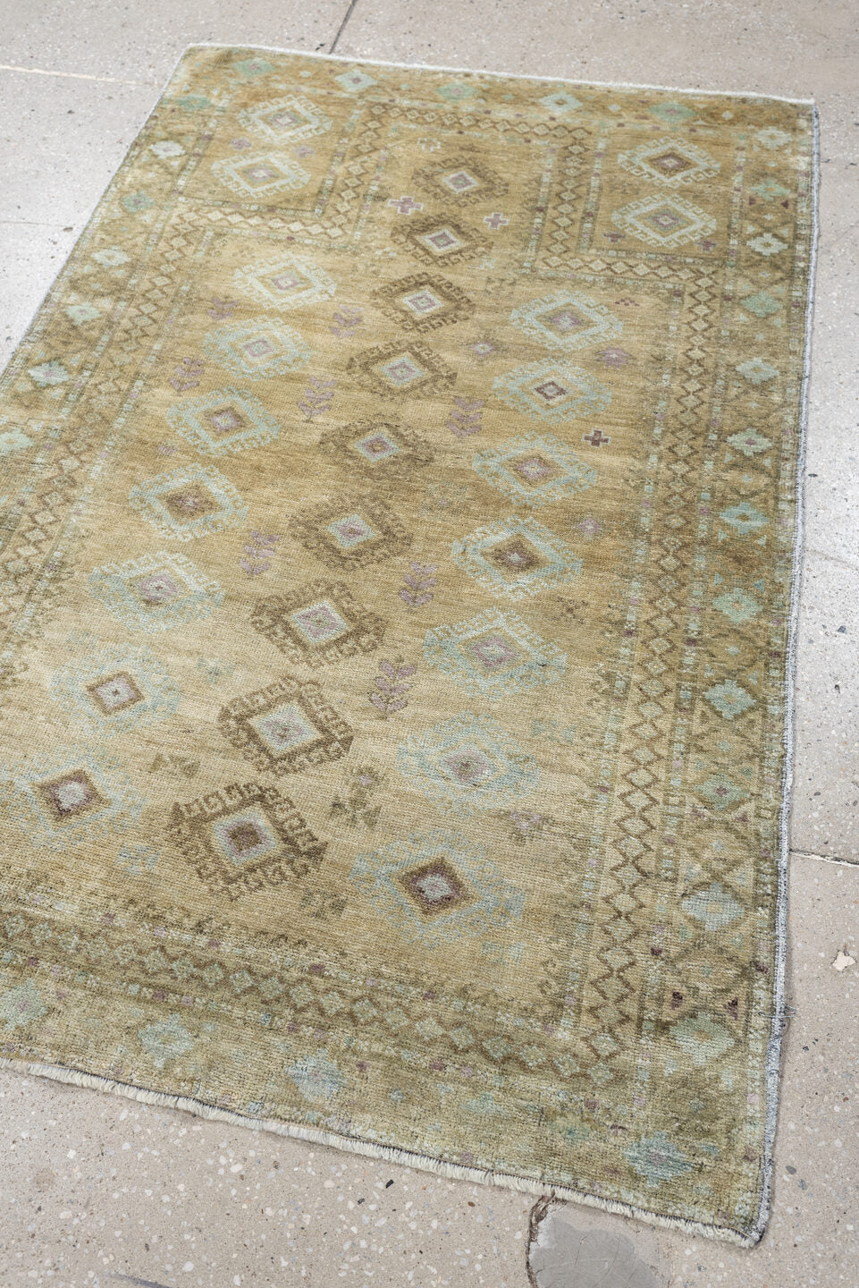 3' x 4' one-of-a-kind handmade antique Belouch small size rug. Color palette: camel, taupe, ivory, pale aqua, soft lavender