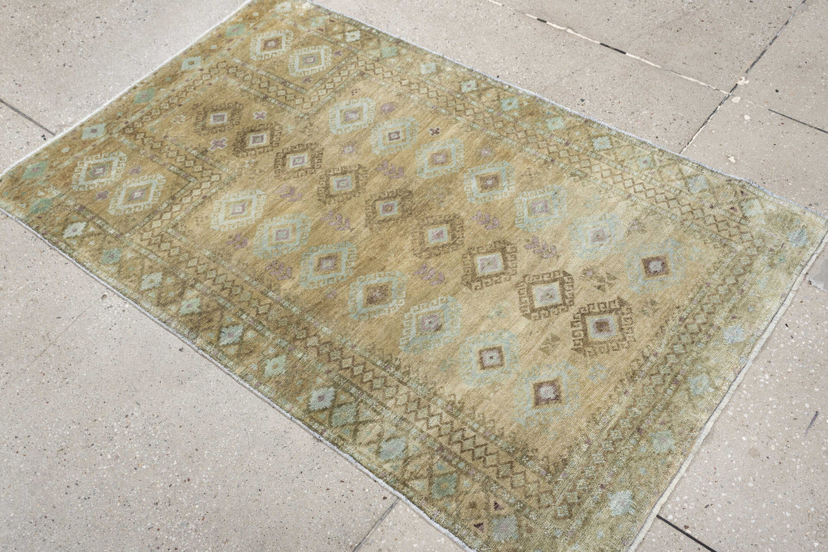 3' x 4' one-of-a-kind handmade antique Belouch small size rug. Color palette: camel, taupe, ivory, pale aqua, soft lavender