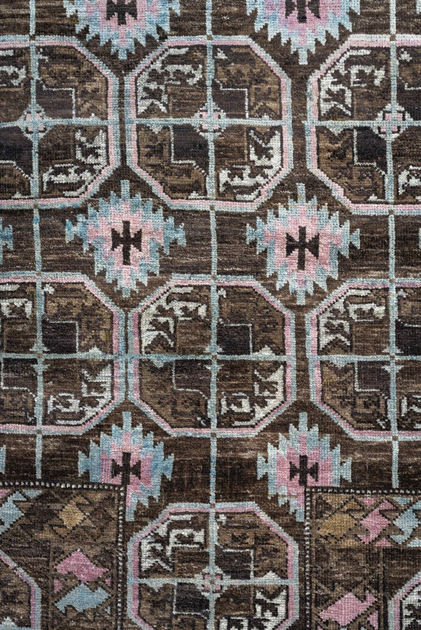 2' x 4' one-of-a-kind handmade antique Belouch small size rug. Color palette: brown, camel, blush pink, pale aqua, ivory