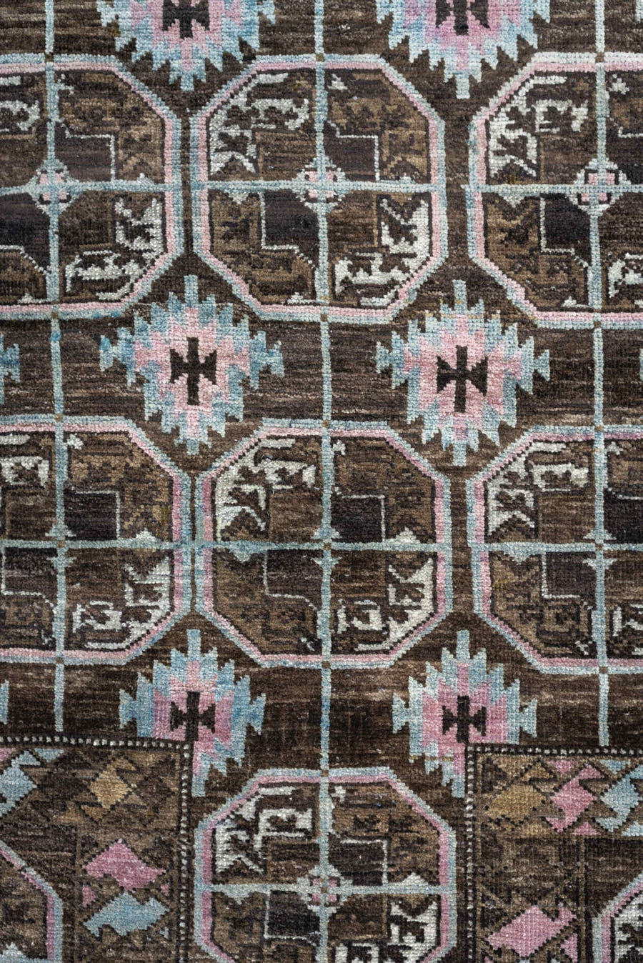 2' x 4' one-of-a-kind handmade antique Belouch small size rug. Color palette: brown, camel, blush pink, pale aqua, ivory
