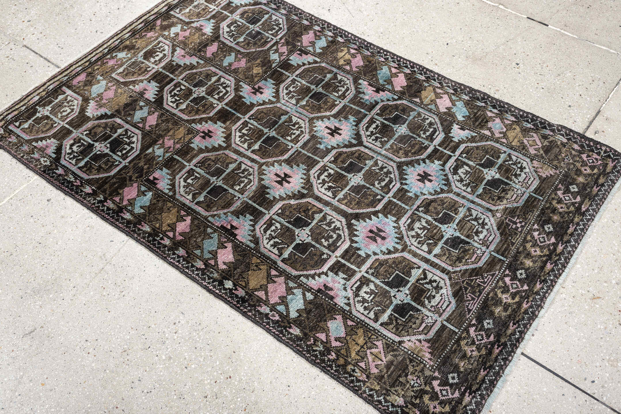 2' x 4' one-of-a-kind handmade antique Belouch small size rug. Color palette: brown, camel, blush pink, pale aqua, ivory