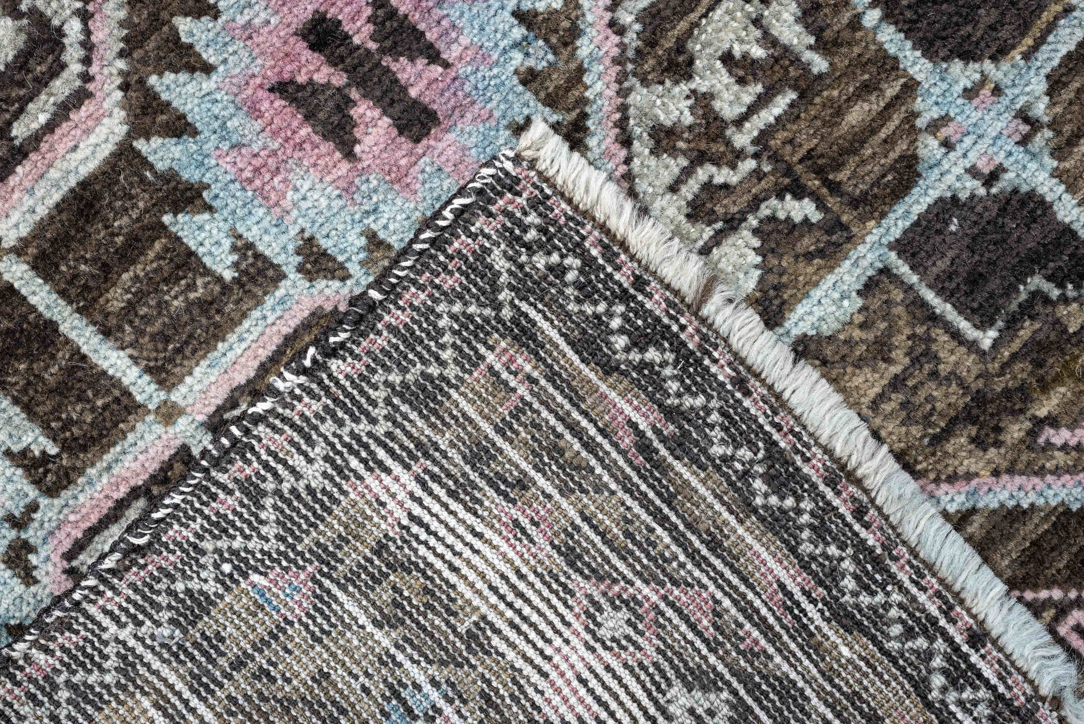 2' x 4' one-of-a-kind handmade antique Belouch small size rug. Color palette: brown, camel, blush pink, pale aqua, ivory