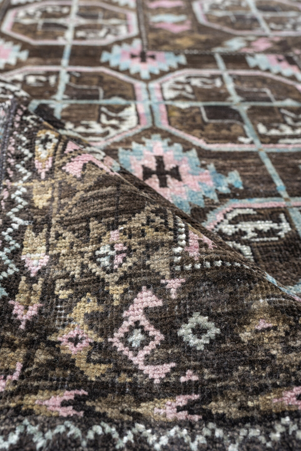 2' x 4' one-of-a-kind handmade antique Belouch small size rug. Color palette: brown, camel, blush pink, pale aqua, ivory