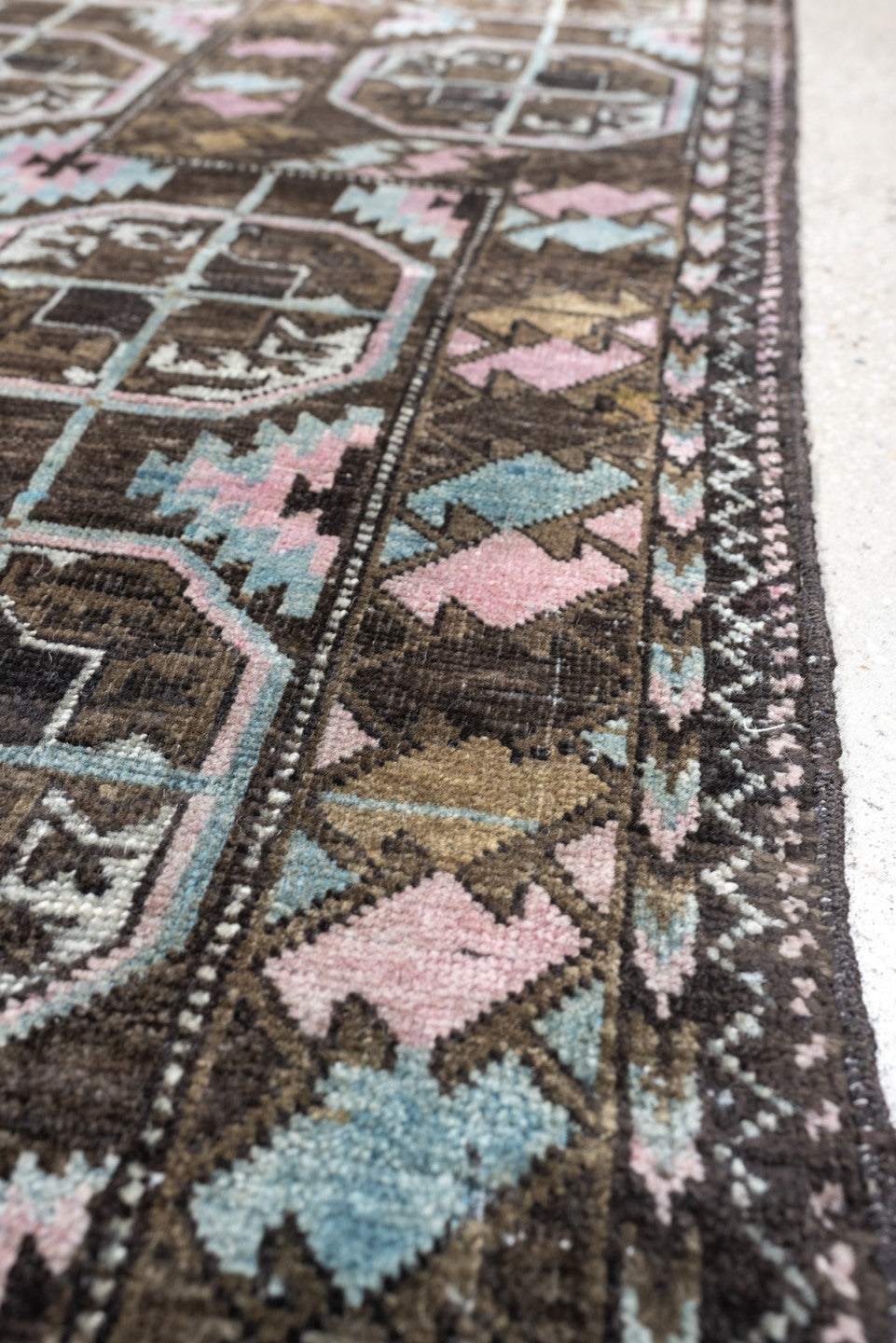 2' x 4' one-of-a-kind handmade antique Belouch small size rug. Color palette: brown, camel, blush pink, pale aqua, ivory