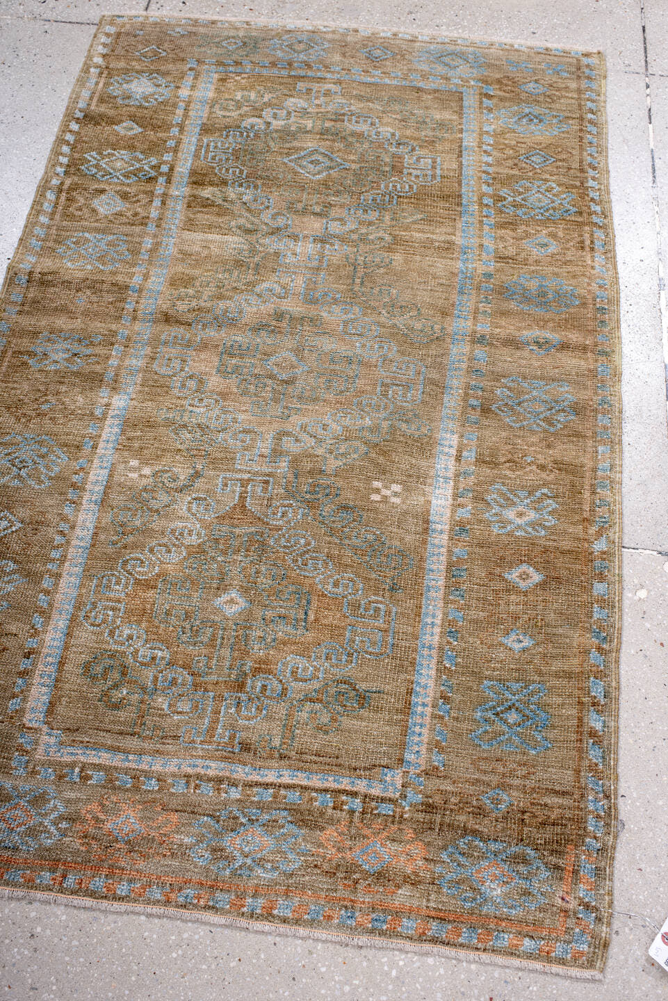 3' x 4' one-of-a-kind handmade antique Belouch small size rug. Color palette: taupe, camel, sky_blue, ivory, terra_cotta