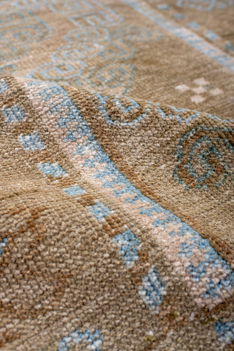 3' x 4' one-of-a-kind handmade antique Belouch small size rug. Color palette: taupe, camel, sky_blue, ivory, terra_cotta