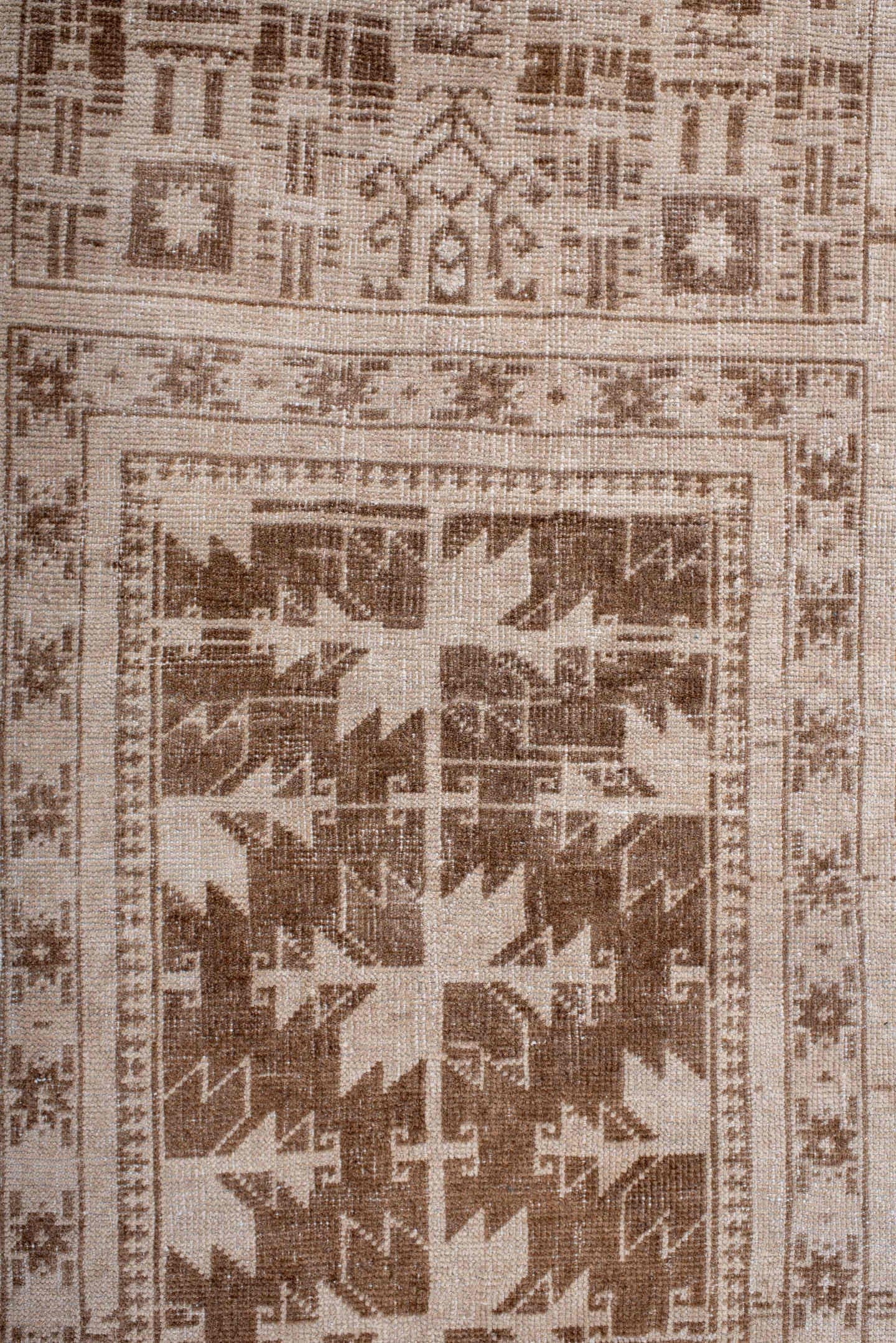 2' x 4' one-of-a-kind handmade antique Belouch small size rug. Color palette: ivory, taupe, camel, brown, beige, gray