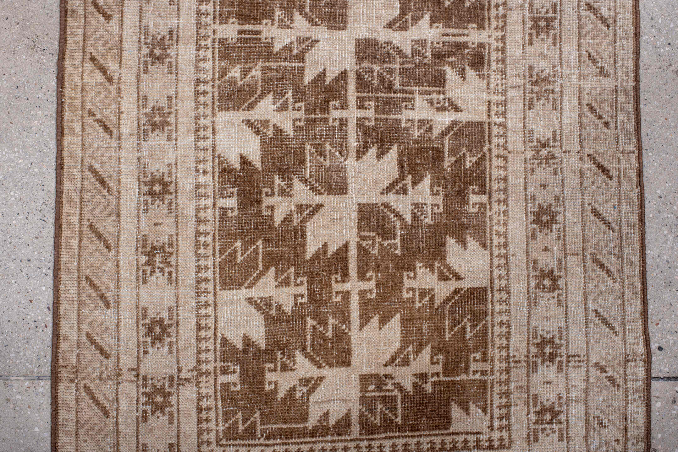 2' x 4' one-of-a-kind handmade antique Belouch small size rug. Color palette: ivory, taupe, camel, brown, beige, gray