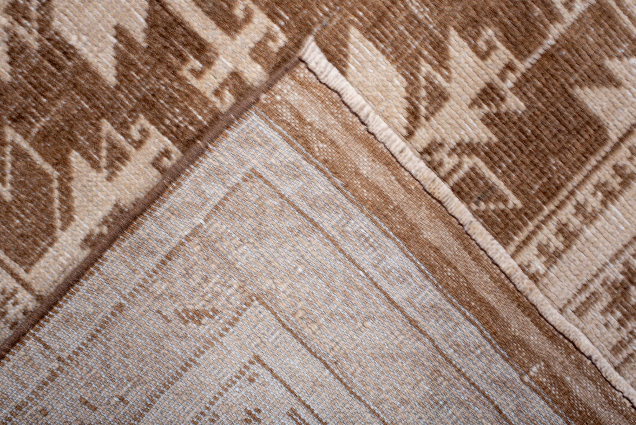 2' x 4' one-of-a-kind handmade antique Belouch small size rug. Color palette: ivory, taupe, camel, brown, beige, gray