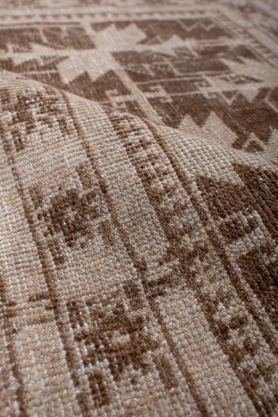 2' x 4' one-of-a-kind handmade antique Belouch small size rug. Color palette: ivory, taupe, camel, brown, beige, gray