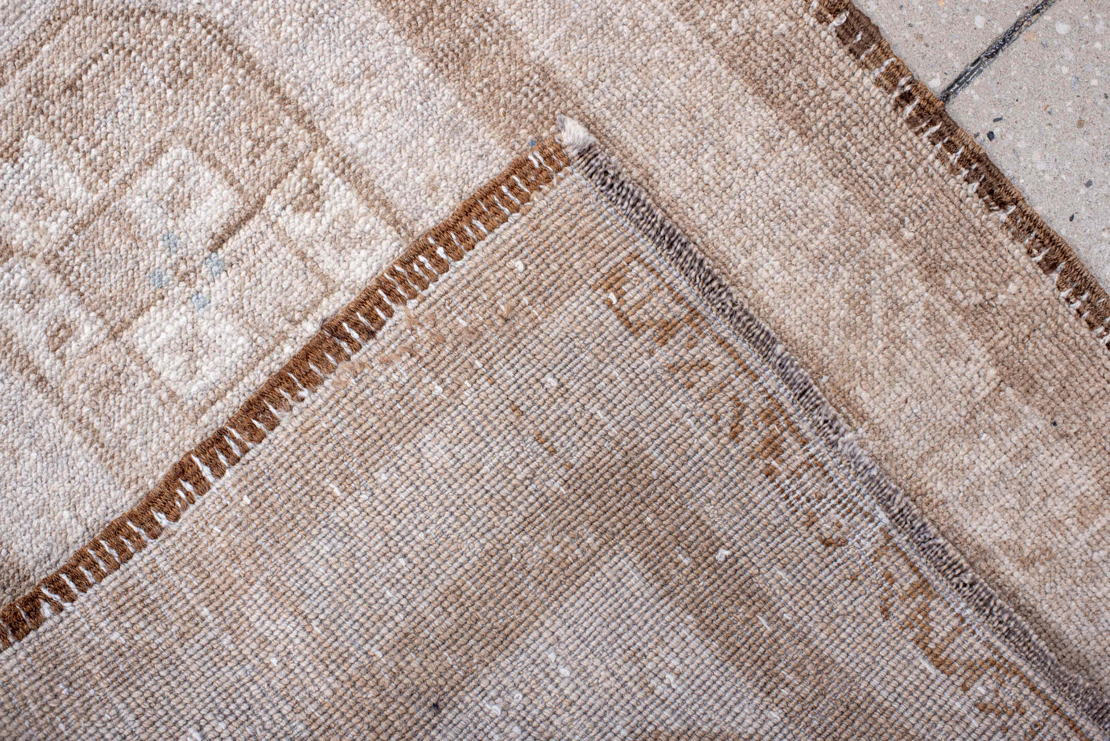 1' x 9' one-of-a-kind handmade antique Afghan rug. Color palette: ivory, taupe, beige, camel, sand, gray