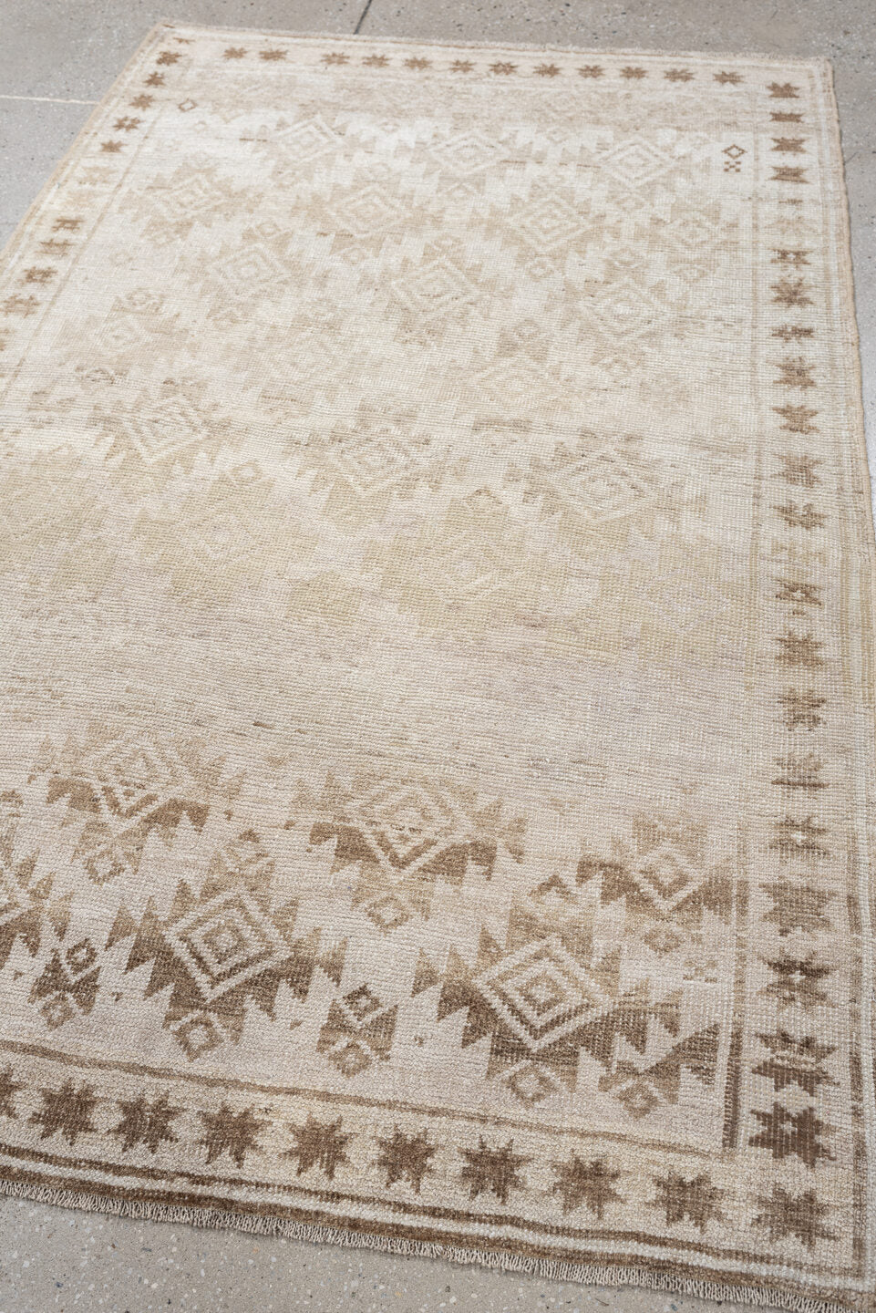 3' x 5' one-of-a-kind handmade antique Belouch small size rug. Color palette: ivory, camel, taupe, sand, beige, gray