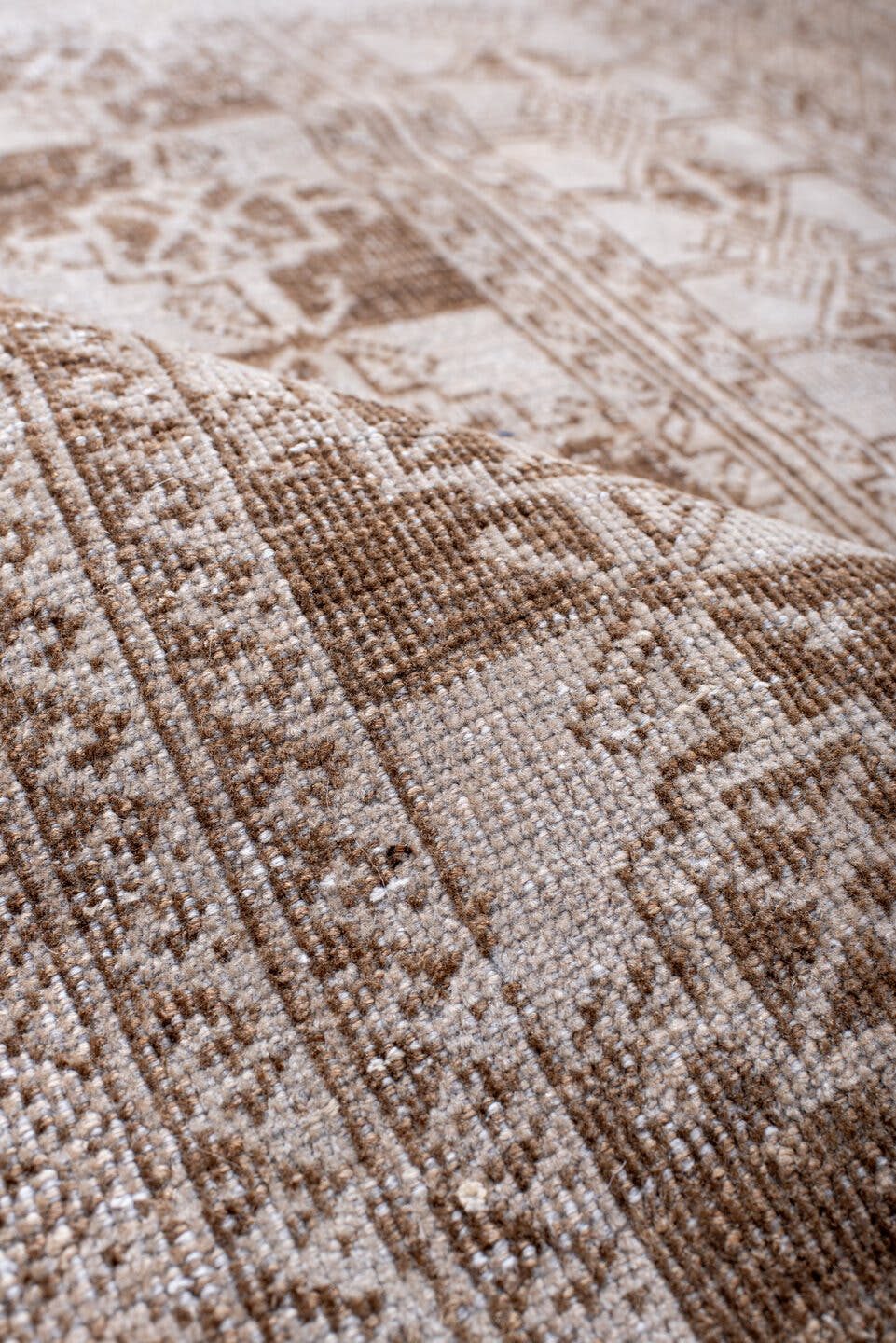 3' x 5' one-of-a-kind handmade vintage Belouch small size rug. Color palette: ivory, taupe, beige, camel, brown, gray
