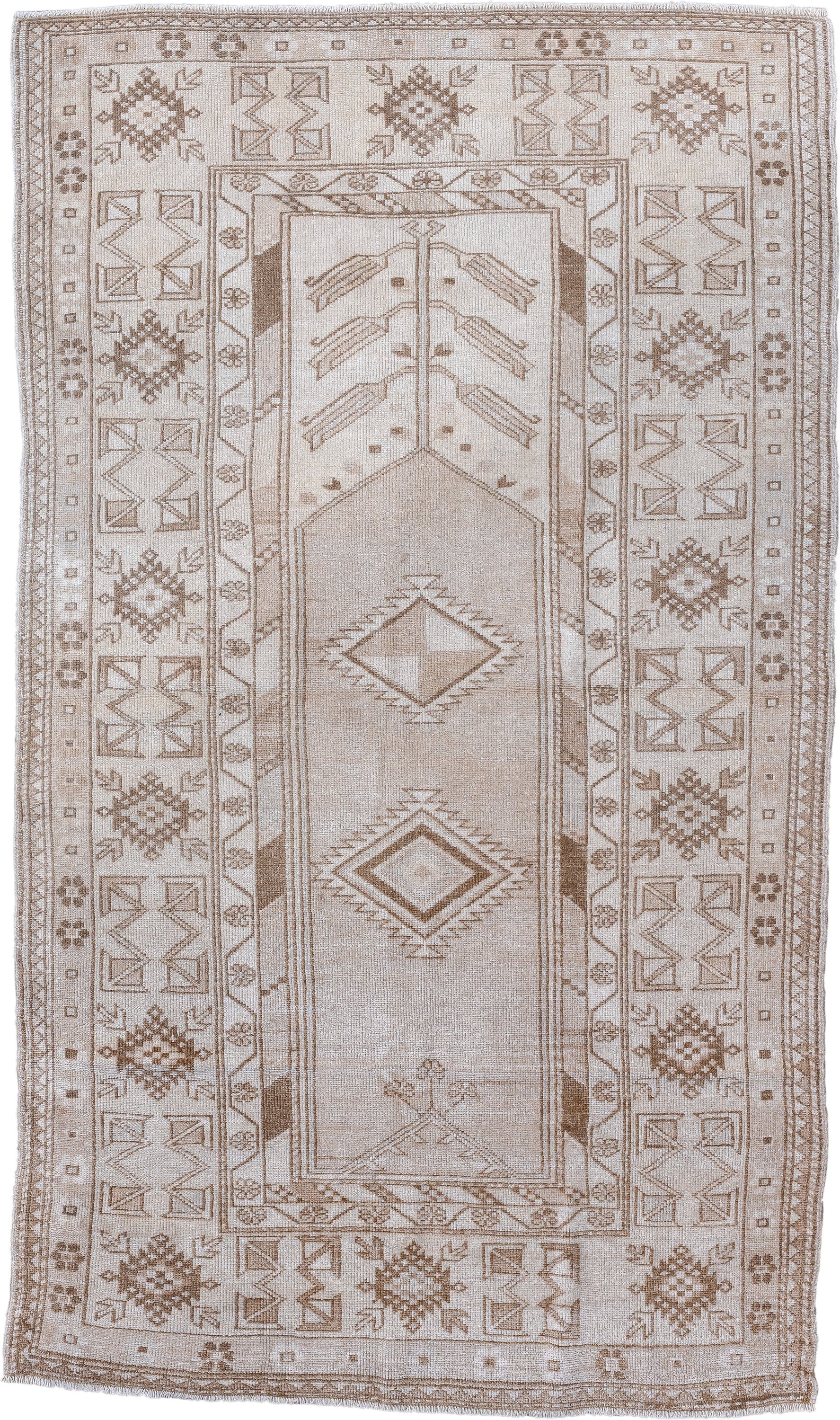 4' x 7' one-of-a-kind handmade vintage Anatolian rug. Color palette: ivory, taupe, beige, camel, light brown, gray, brown