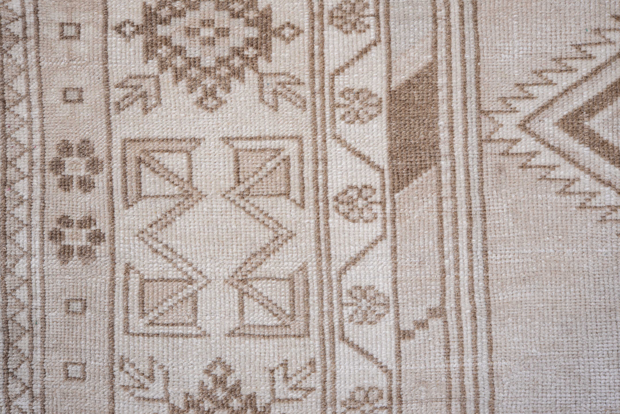 4' x 7' one-of-a-kind handmade vintage Anatolian rug. Color palette: ivory, taupe, beige, camel, light brown, gray, brown