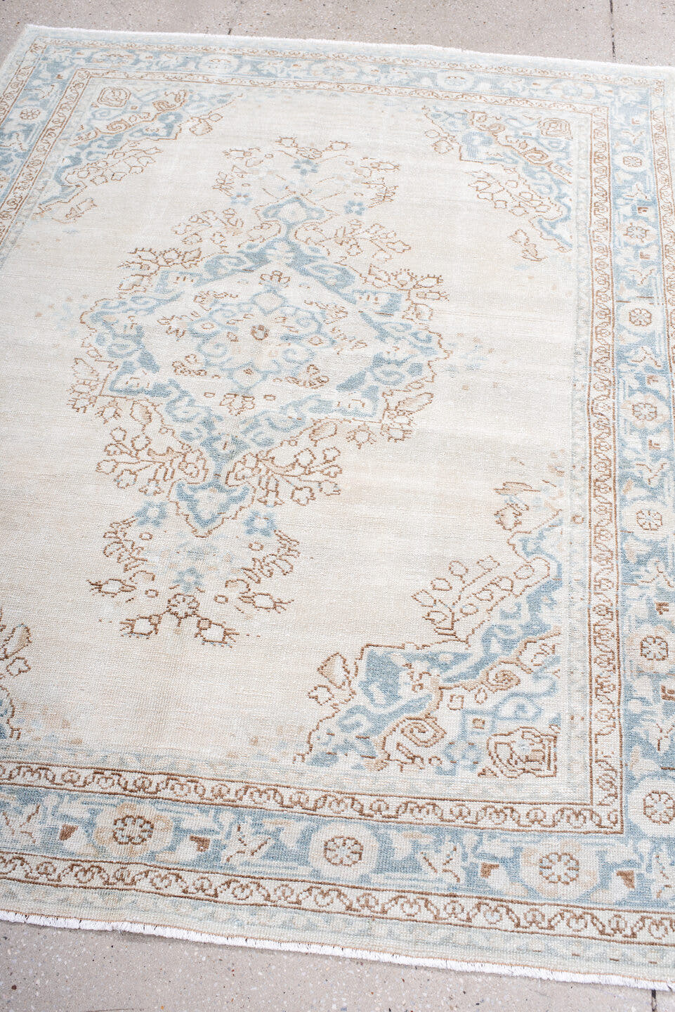 5' x 6' one-of-a-kind handmade antique Malayer rug. Color palette: ivory, pale blue, taupe, cream, camel, light blue, beige
