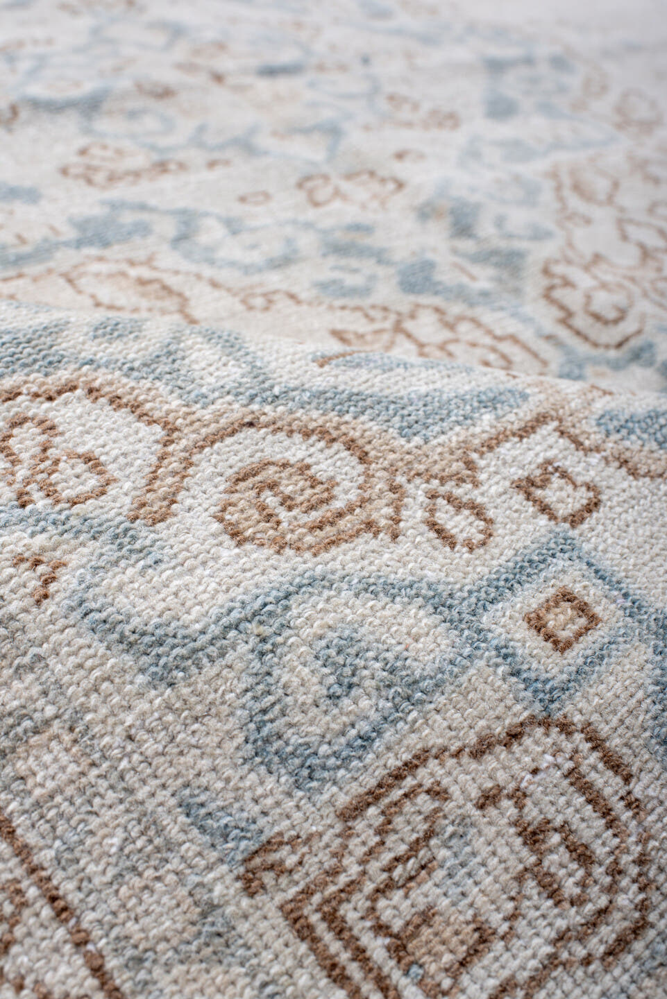5' x 6' one-of-a-kind handmade antique Malayer rug. Color palette: ivory, pale blue, taupe, cream, camel, light blue, beige