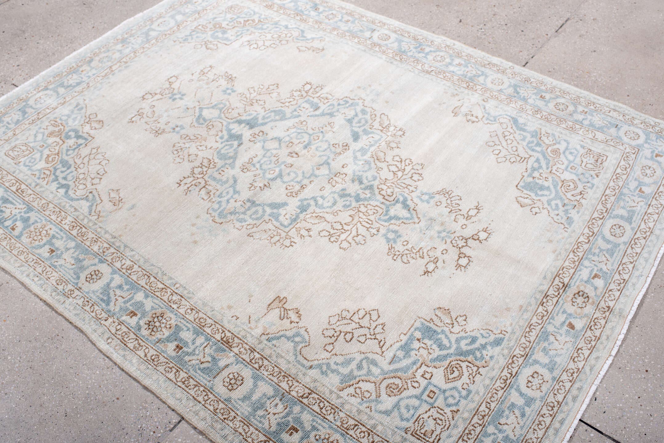 5' x 6' one-of-a-kind handmade antique Malayer rug. Color palette: ivory, pale blue, taupe, cream, camel, light blue, beige