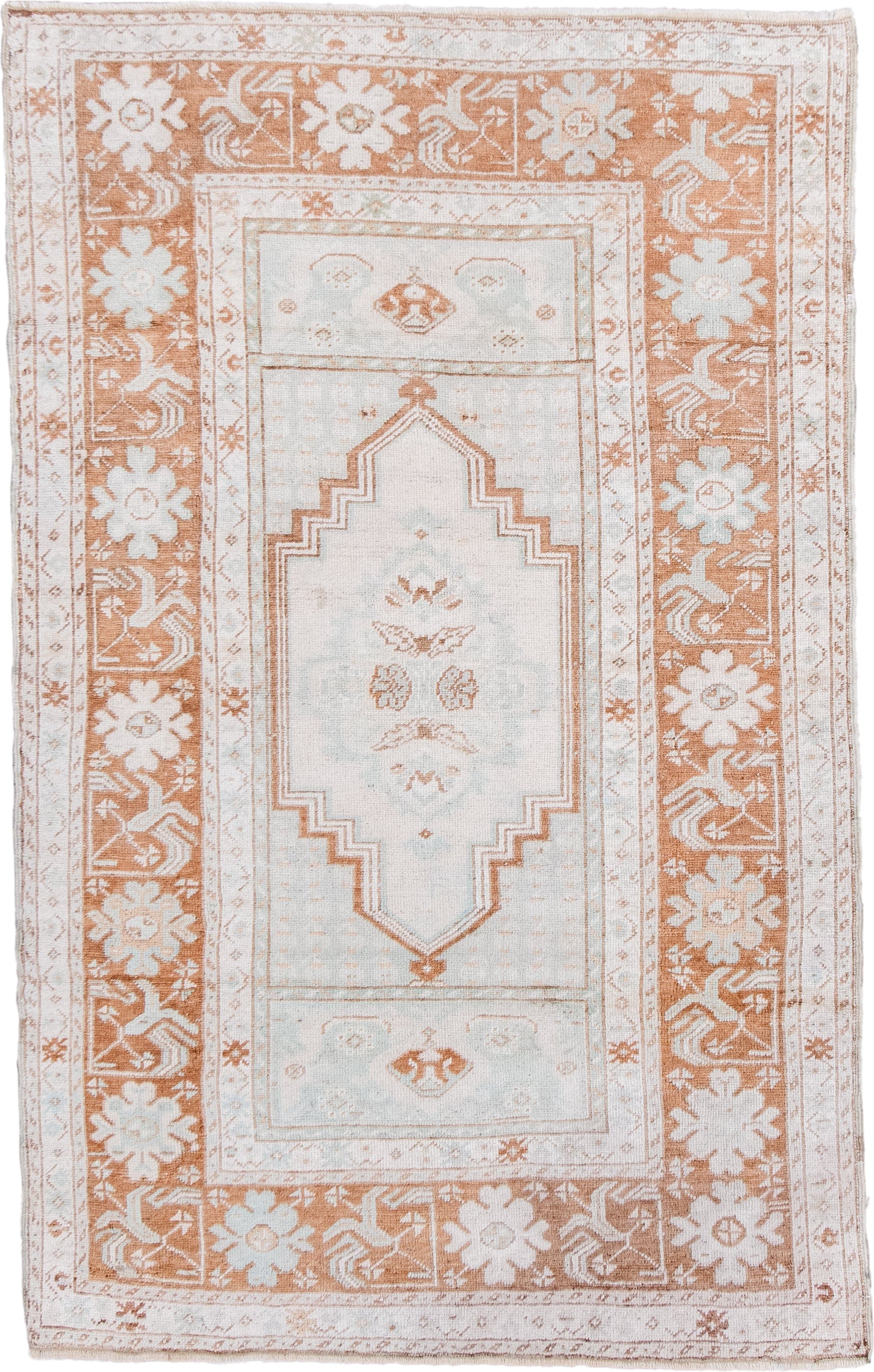 3' x 5' one-of-a-kind handmade antique Anatolian small size rug. Color palette: ivory, terra cotta, cream, pale blue, beige