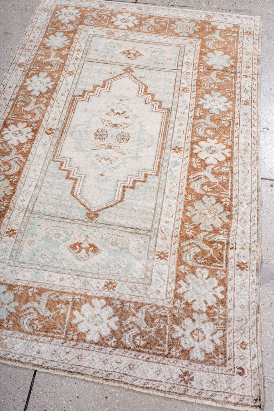 3' x 5' one-of-a-kind handmade antique Anatolian small size rug. Color palette: ivory, terra cotta, cream, pale blue, beige