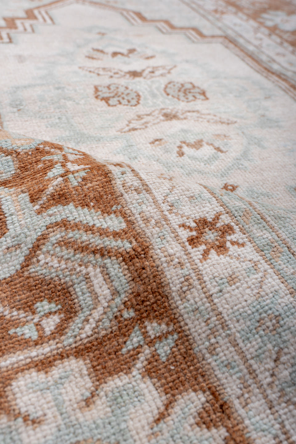 3' x 5' one-of-a-kind handmade antique Anatolian small size rug. Color palette: ivory, terra cotta, cream, pale blue, beige