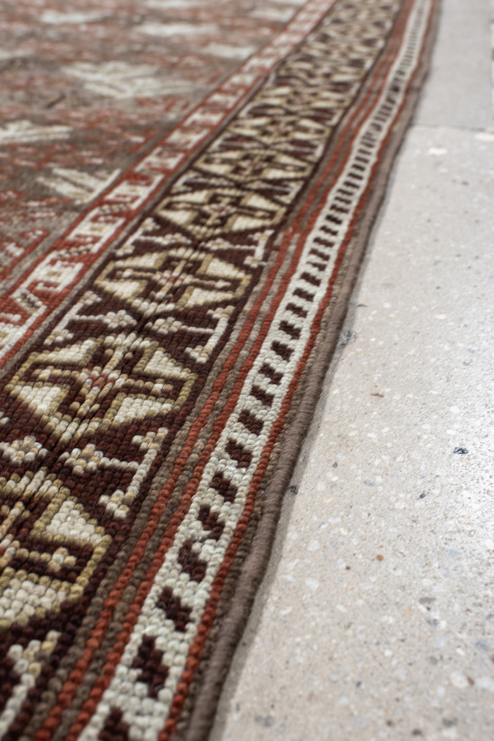4' x 9' one-of-a-kind handmade antique Kurd runner rug. Color palette: taupe, brown, ivory, rust, charcoal, beige, gray