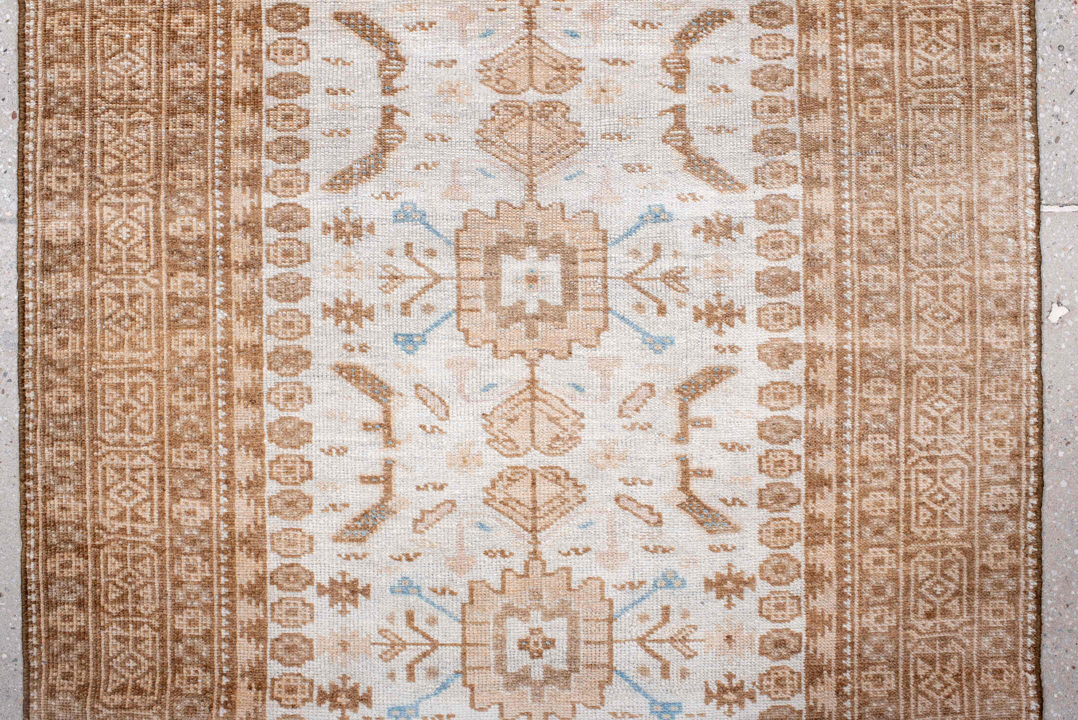 2' x 10' one-of-a-kind handmade antique Belouch runner rug. Color palette: ivory, camel, taupe, sand, pale blue, beige, gray