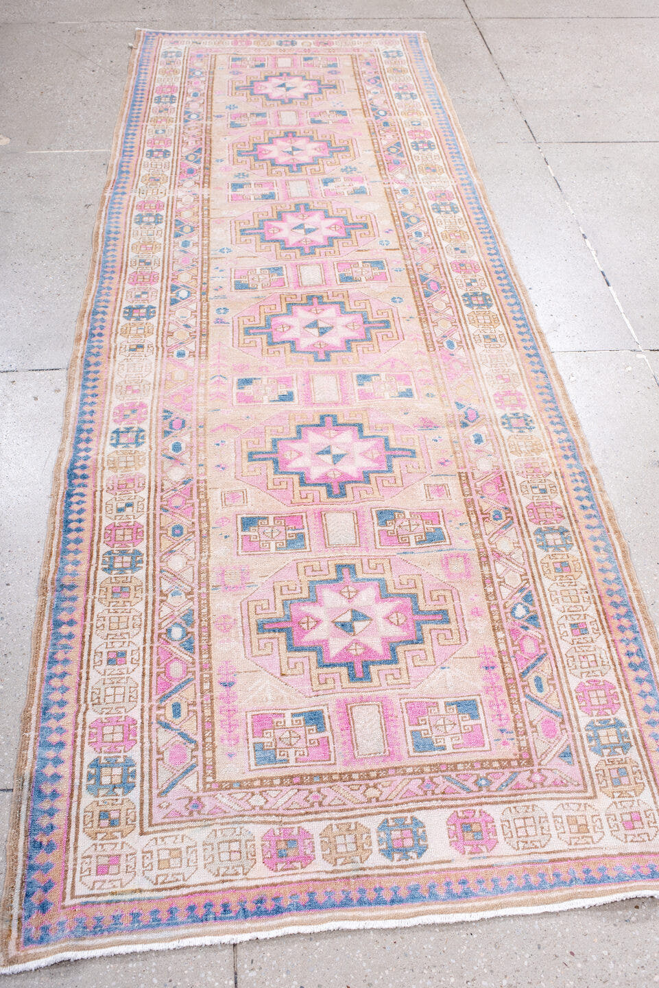 3' x 9' one-of-a-kind handmade antique Sarab runner rug. Color palette: ivory, blush, sky blue, camel, taupe, rose, pink